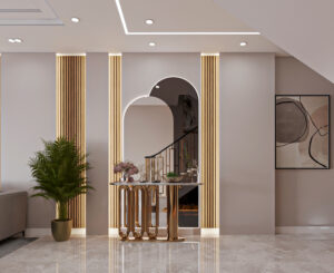 Modern luxury entrance with gold accents and a glass console table.